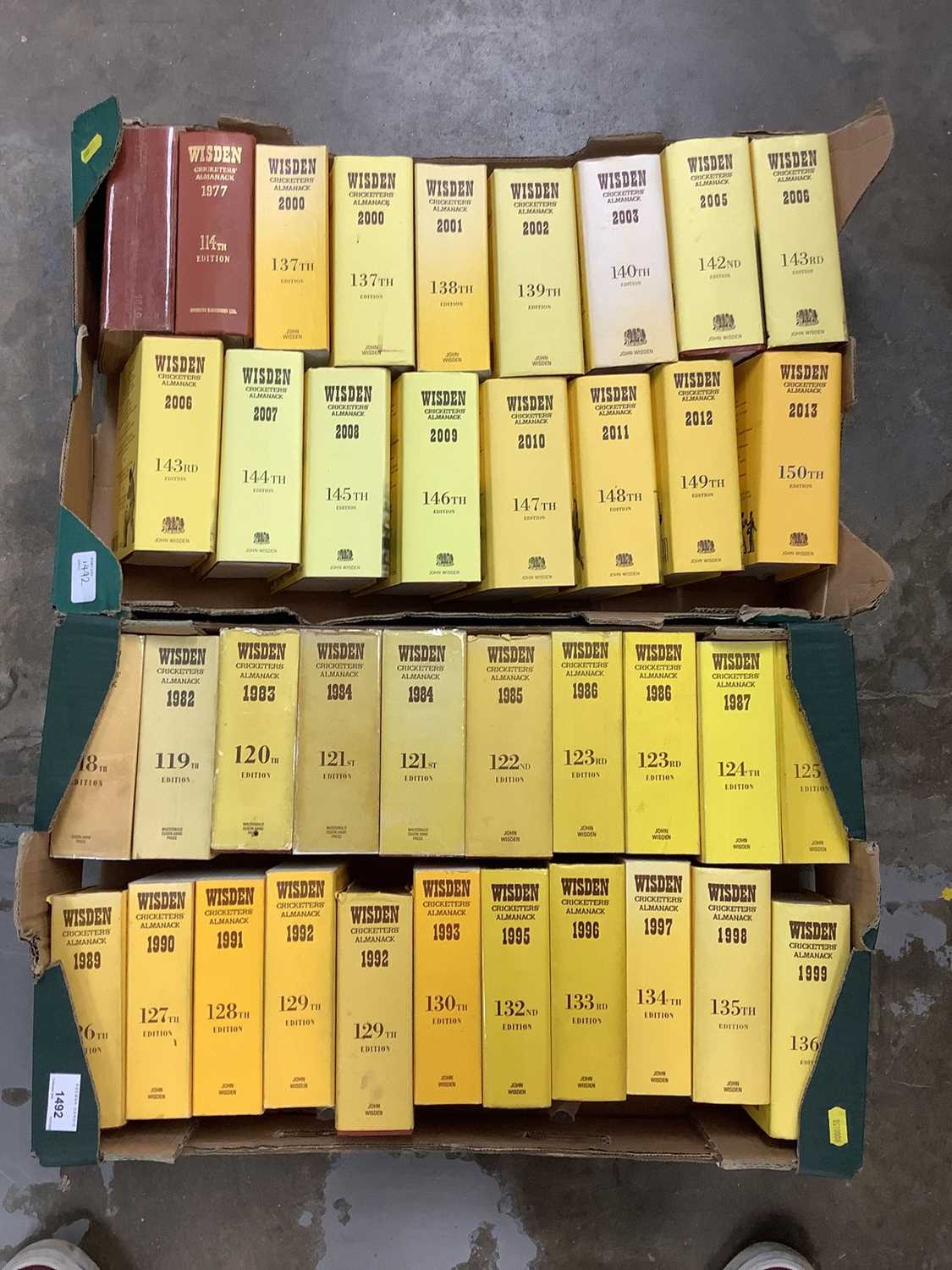 Lot 1492 - Two boxes of Wisden books