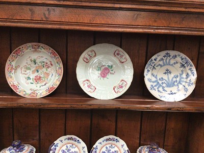 Lot 340 - Two 18th century Chinese famille rose plates, and an 18th century blue and white delft ware plate (3)