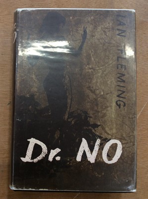 Lot 1550 - Dr. No, Ian Fleming, Cape 1958 1st Edition with dancing lady on black cover.  Original but later dust jacket marked 18s. In protective cover.