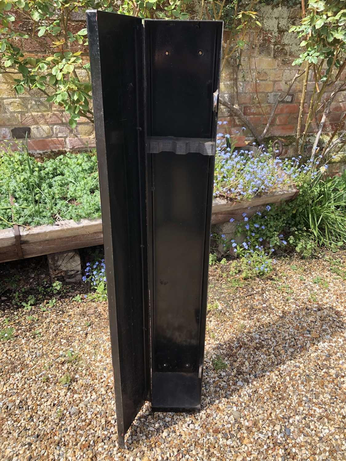 Lot 1042 - Black painted metal gun safe for two guns, 123cm high