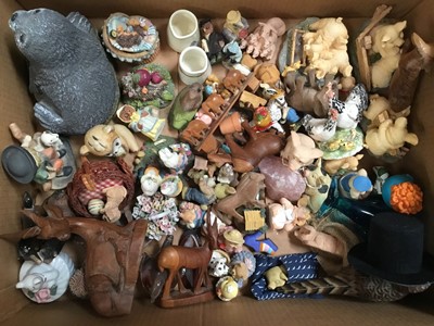 Lot 373 - Box of novelty animal figures, wooden African animals, carved wooden plaque and other figures