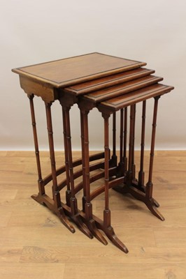 Lot 1303 - Late 19th / early 20th century nest of four mahogany tables