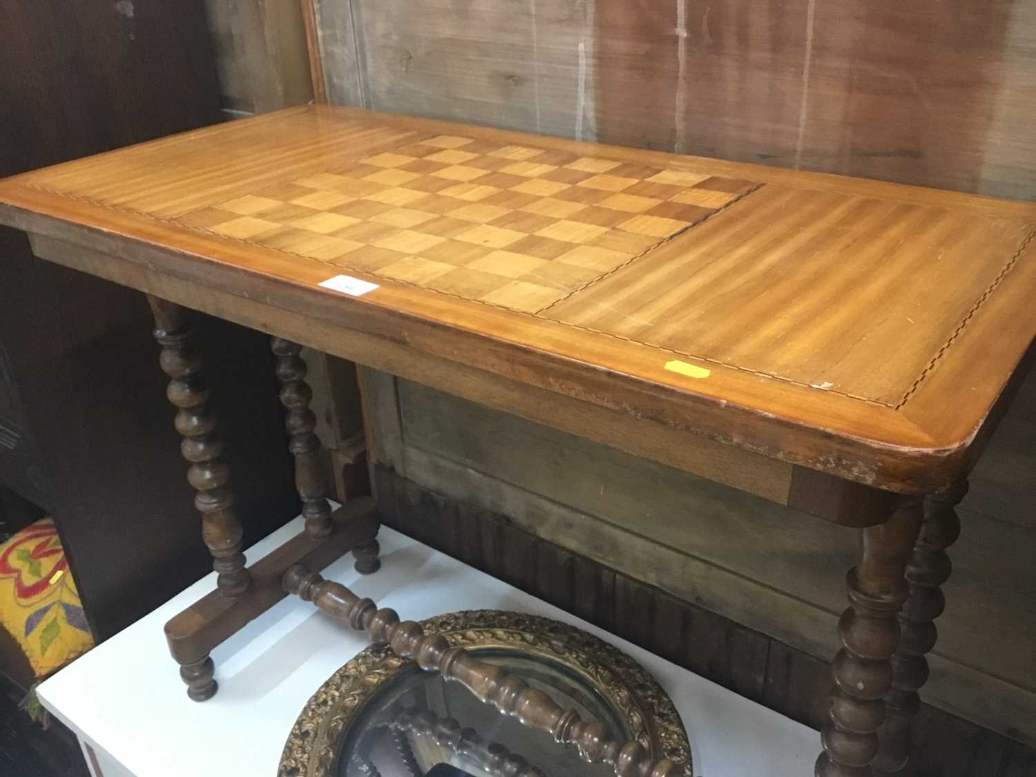 Lot 1046 - Victorian inlaid walnut games table on