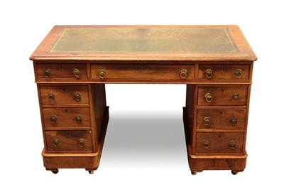 Lot 1311 - Victorian mahogany twin pedestal desk, the rounded rectangular moulded top with inset tooled leather,mhaving nine drawers about the kneehole on castors, 120cm wide x 63cm deep x 75cm high