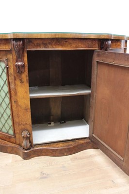 Lot 1314 - Mid Victorian walnut serpentine credenza