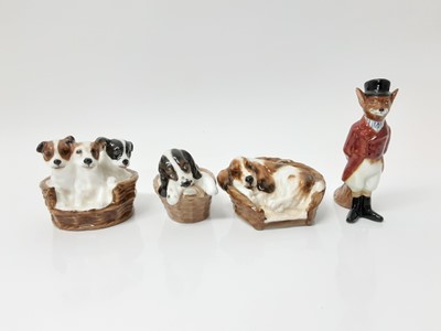Lot 9 - Royal Doulton fox D6445 and a collection of royal doulton and other dogs including HN2585 and HN2588 (16)