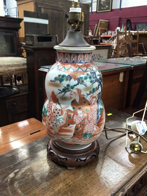 Lot 583 - Japanese Kutani porcelain vase, converted to a lamp on a wooden stand, total heigh 38cm