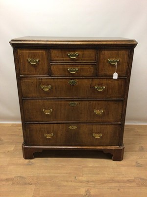 Lot 1339 - 18th century walnut crossbanded chest of drawers, with two short over three long graduated drawers between canted reeded angles on bracket feet, 95cm wide x 55cm deep x 106cm high