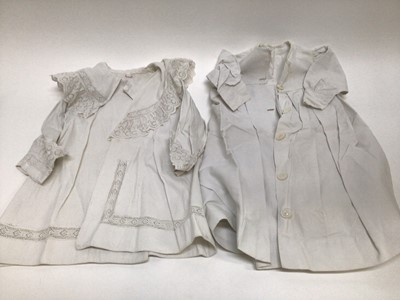 Lot 1932 - Selection of children's Victorian clothing including two cotton grograin coats one with broderie anglaise lace collar the other is collarless. Some lace and cutout-work dresses, babies white-work c...