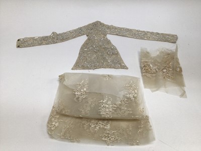 Lot 1933 - Silk and beaded belt with front panel, possibly from a wedding dress plus some Ostrich feathers. Also some pieces of silk floss embroidered nets.