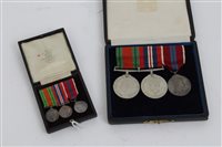 Lot 304 - Second World War / Elizabeth II trio -...