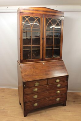 Lot 947 - George IV mahogany bureau bookcase