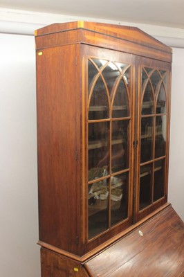 Lot 947 - George IV mahogany bureau bookcase