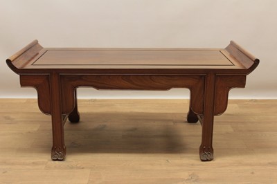 Lot 1359 - Antique Chinese hardwood low table, with scrolled ends on moulded carved legs ans knotwork carved feet, 101c, wide