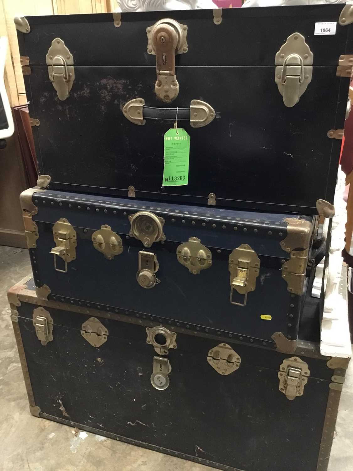 Lot 1064 - Three old trunks