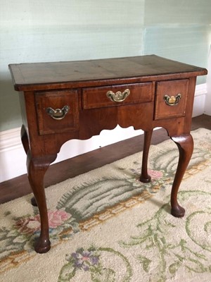 Lot 1367 - George I/II walnut and mahogany lowboy