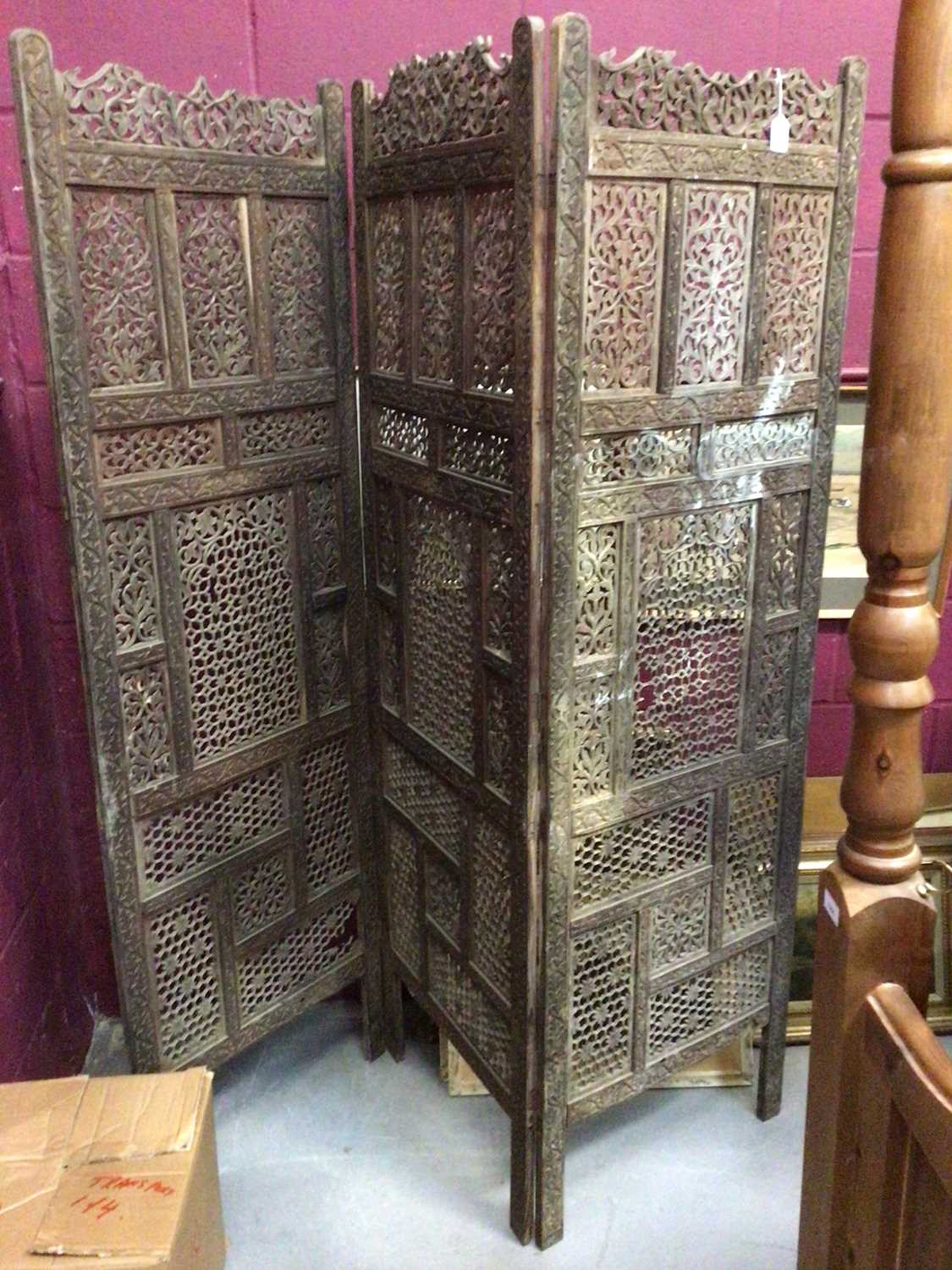 Lot 1081 - Indian carved and pierced hardwood three fold screen