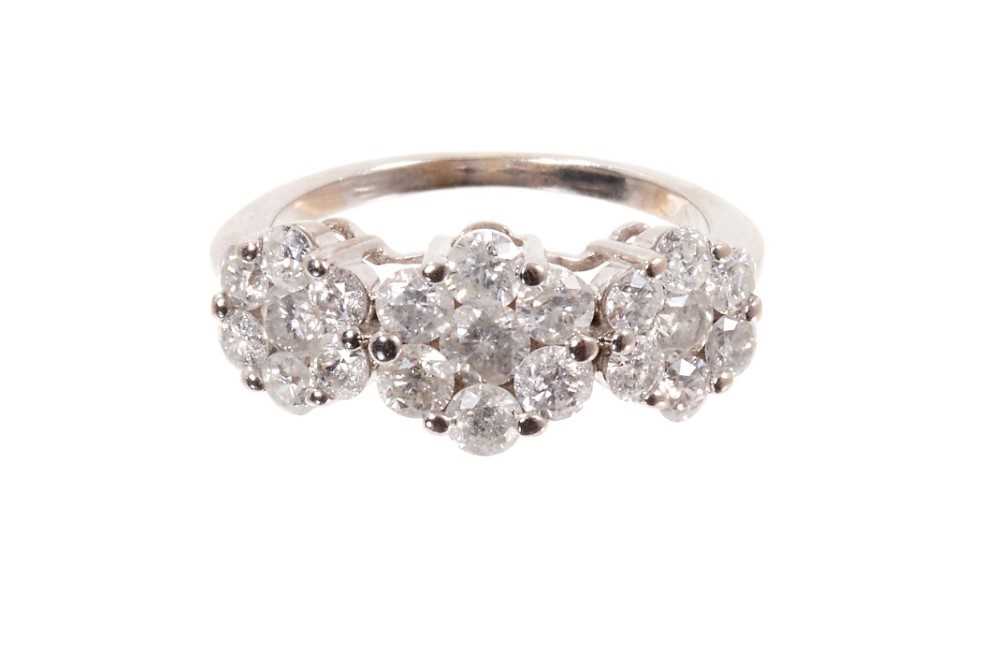 Lot 574 - Diamond cluster ring with three diamond set
