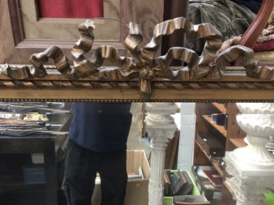 Lot 403 - Large bevelled wall mirror in gilt frame with carved scroll cresting H152xW96cm