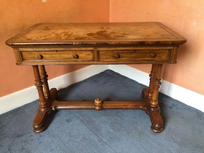 Lot 1397 - Early Victorian walnut writing table