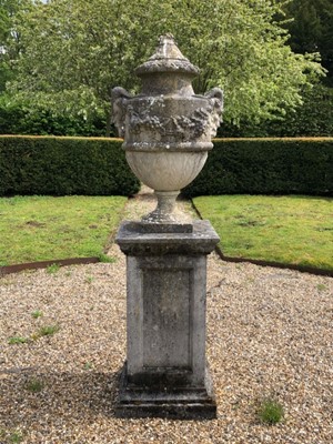 Lot 1403 - Classical urn on square base, 185cm high, the base 49cm square