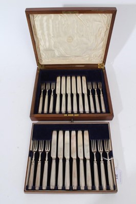 Lot 311 - 1920s silver dessert set comprising 12 pairs of knives and matching forks