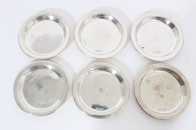 Lot 314 - Set of six contemporary silver wine glass coasters of circular form.