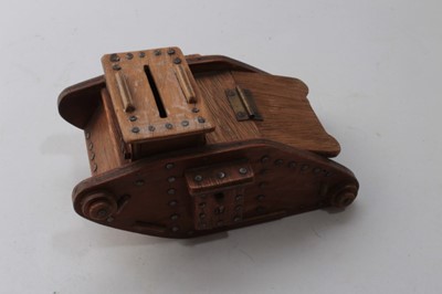 Lot 711 - First World War period scratch built money box in the form of a tank, underside stamped T H 2615, approximately 16cm in length