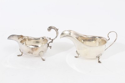 Lot 316 - 1920s silver sauce boat of conventional form and one other.