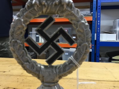 Lot 714 - Second World War period Nazi aluminium civic standard mount in the form of an Eagle clutching a laurel wreath with central Swastika, stamped RZM M4/40/38, 25cm in overall length