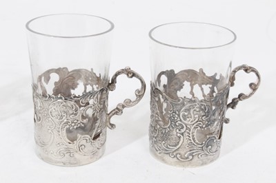 Lot 320 - Set of six 19th century Dutch silver shot/tot glass holders, and five glasses.