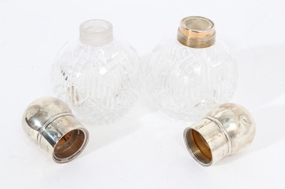 Lot 321 - Two pairs of silver mounted glass perfume bottles of globular form