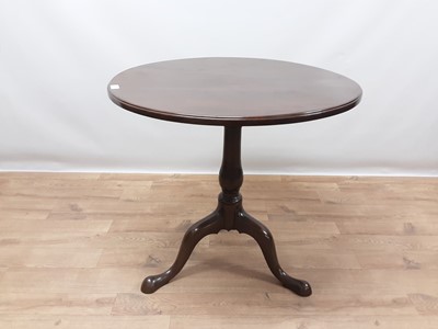 Lot 1412 - George III mahogany tripod wine table, the snap-top on shaped columns and three splayed legs, 73cm diameter x 68cm high