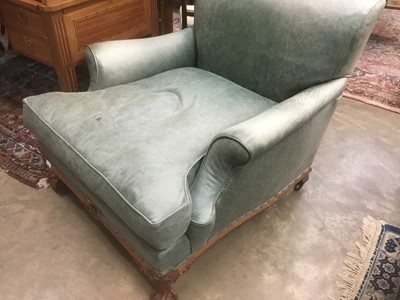 Lot 1415 - Good quality Howard & Sons low armchair, upholstered in blue/green leather with loose seat, on carved cabriole legs and claw and ball feet terminating on brass castors, the rear leg stamped 1238. 2...