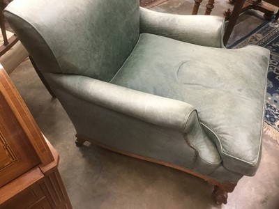 Lot 1415 - Good quality Howard & Sons low armchair, upholstered in blue/green leather with loose seat, on carved cabriole legs and claw and ball feet terminating on brass castors, the rear leg stamped 1238. 2...