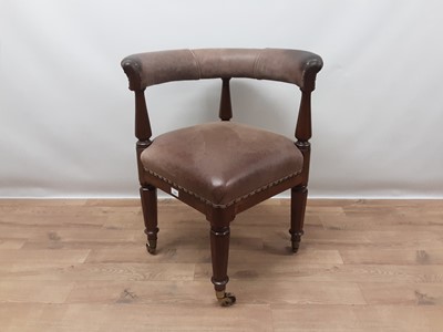 Lot 1421 - Victorian mahogany framed corner desk chair with leather upholstered rail back above a square leather upholstered seat, on turned and faceted supports and brass capped castors, 48cm square x 77cm h...