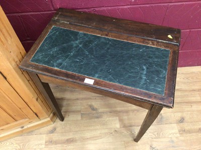 Lot 337 - Edwardian oak desk with leather top and a pin corner cupboard with glazed and panelled door (2)