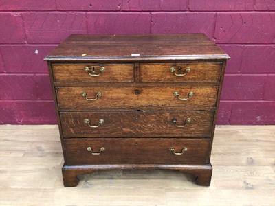 Lot 339 - 19th century oak chest of two shorts and three long draws on bracket feet