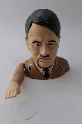 Lot 845 - Reproduction cast iron money box in the form of Adolf Hitler, 16.5cm in height