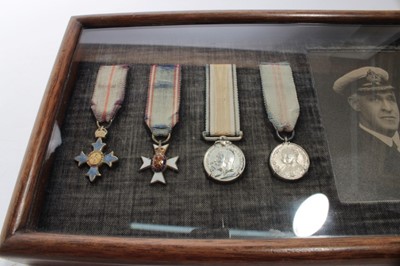 Lot 764 - Collection of seven miniature medals comprising C.B.E., M.V.O. First World War Victory medal, 1935 Silver Jubilee medal, Order of St Anislaus, Order of The Dannenburg