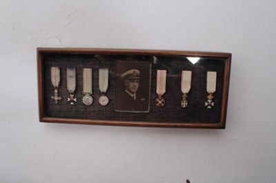 Lot 764 - Collection of seven miniature medals comprising C.B.E., M.V.O. First World War Victory medal, 1935 Silver Jubilee medal, Order of St Anislaus, Order of The Dannenburg