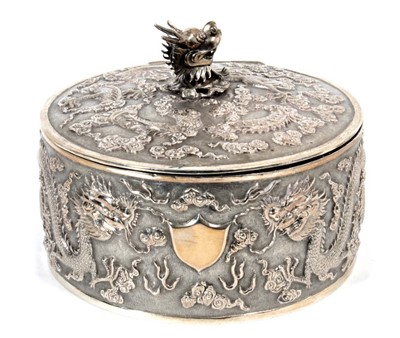 Lot 411 - Late 19th/early 20th century Chinese Export silver box of circular form, with dragon decoration