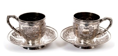 Lot 414 - Pair late 19th/early 20th century Chinese Export silver cups and saucers