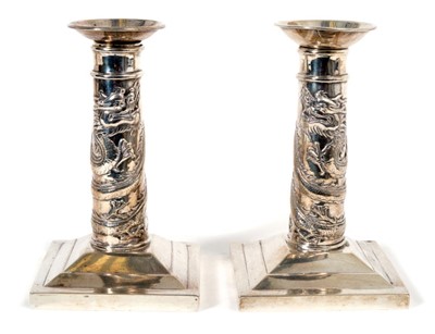 Lot 415 - Pair of late 19th century Chinese Export silver candlesticks