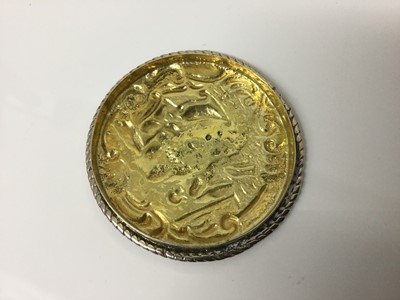 Lot 421 - Late 19th/early 20th century white metal box of circular form, with gilded interior
