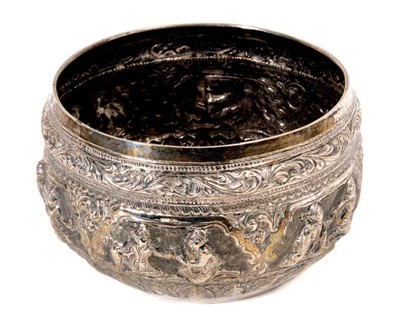 Lot 427 - Late 19th/early 20th century Burmese silver bowl with raised scroll and leaf decoration