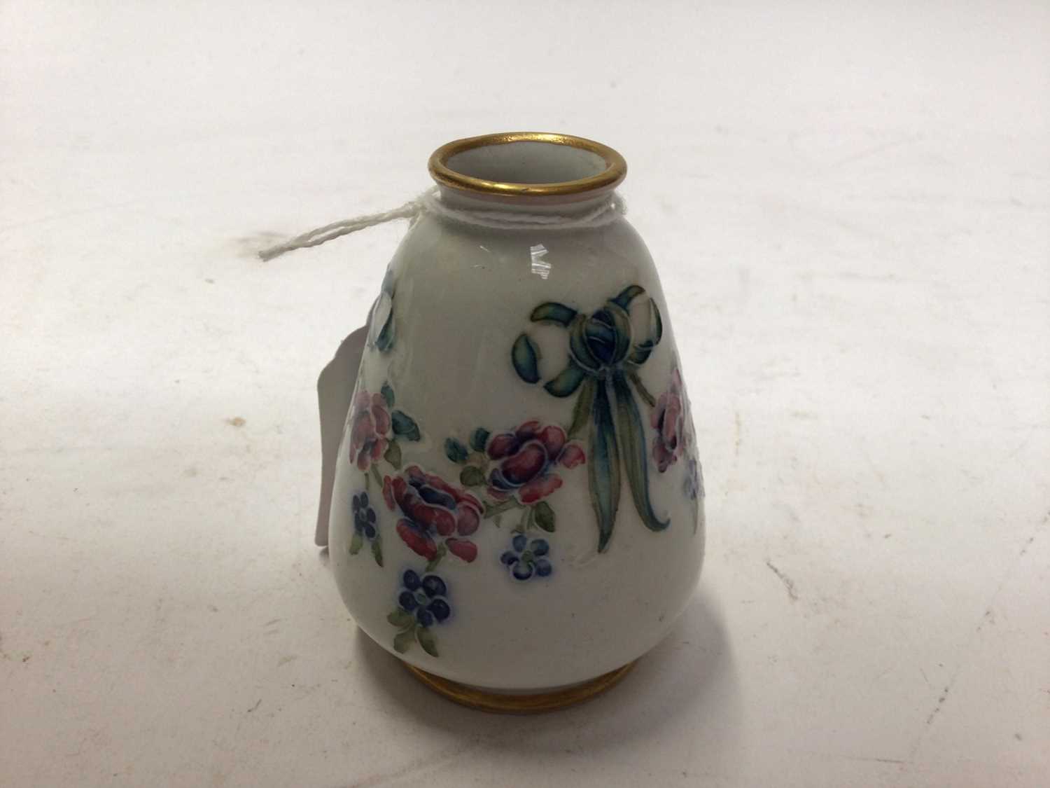 Lot 1000 - Early William Moorcroft MacIntyre late Florian ware miniature vase with tube lined ribbon and floral festoons, painted signature and printed mark to base, pattern number M2638. Height approximately...