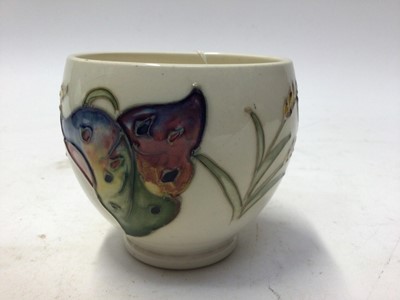 Lot 125 - Moorcroft pottery vase/pot with tube lined vine leaf and wheat design, with original paper label to the base.