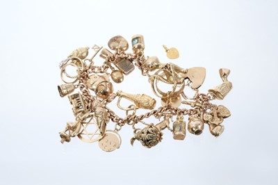 Lot 595 - 9ct gold charm bracelet