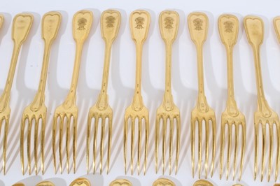 Lot 15 - Late 19th French gilded fiddle thread pattern dessert flatware by Christofle, Paris, some engraved with Continental coronet and arms, comprising 12 dessert knives and 12 dessert forks (24) Provenan...